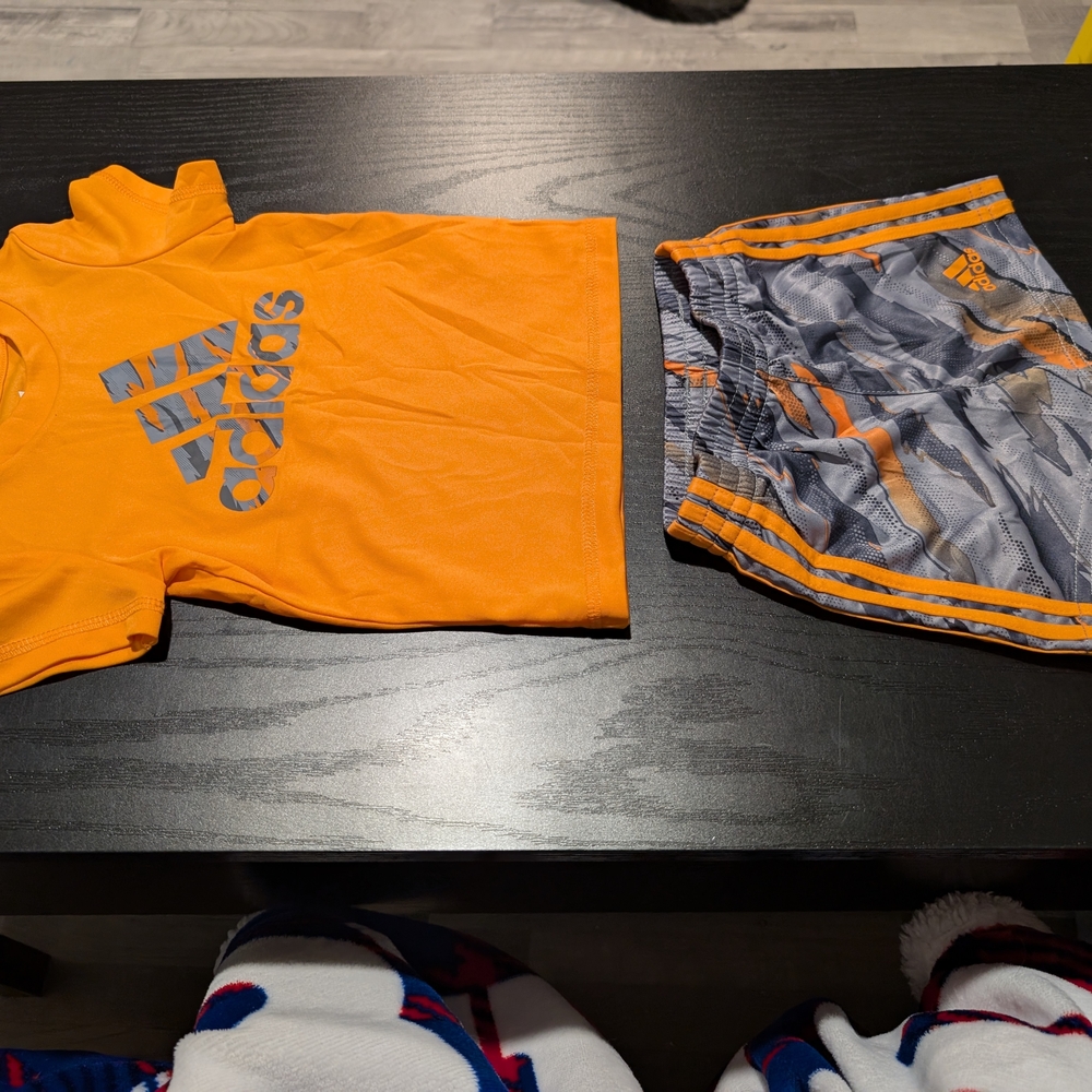 Adidas Vibrant Orange Tee and Patterned Gray Shorts